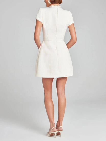GirlyChic Pearl Trim Pocket Mini Dress - Elegant Playful Style